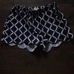 Shorts that has a ruffle pattern at bottom